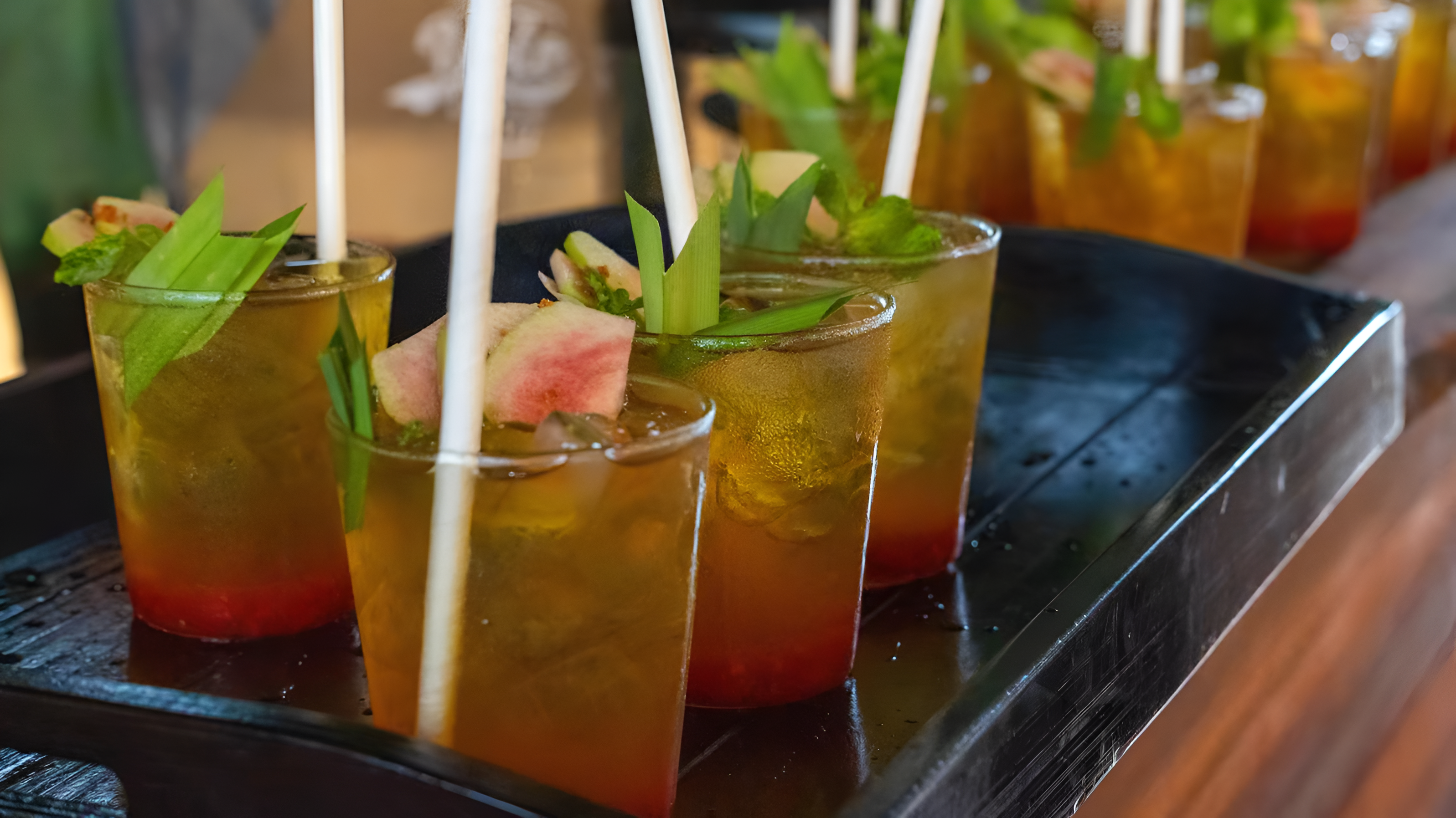 Welcome drinks served on a tray at Yolo Lounge