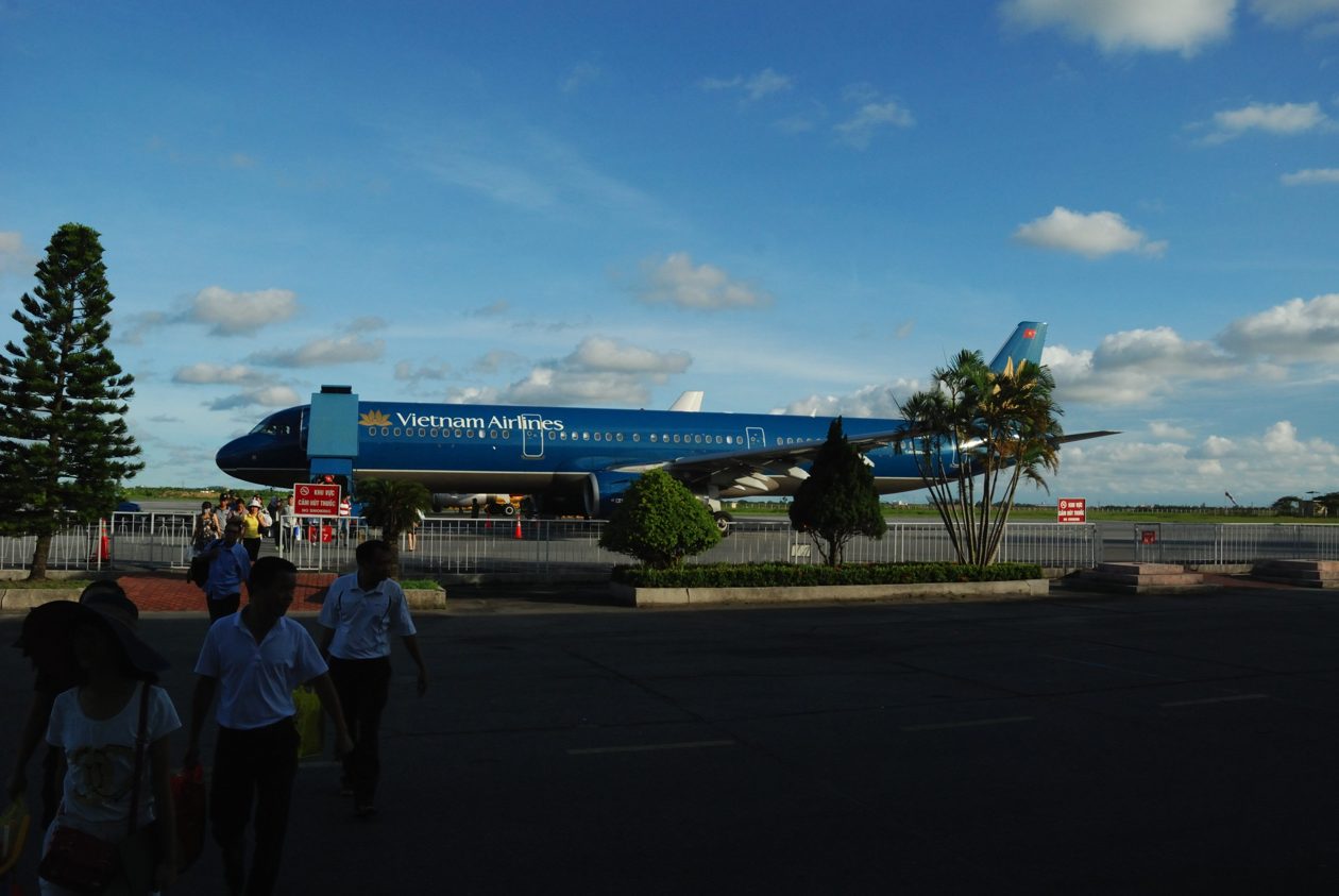 Airplane parked at an airport gate