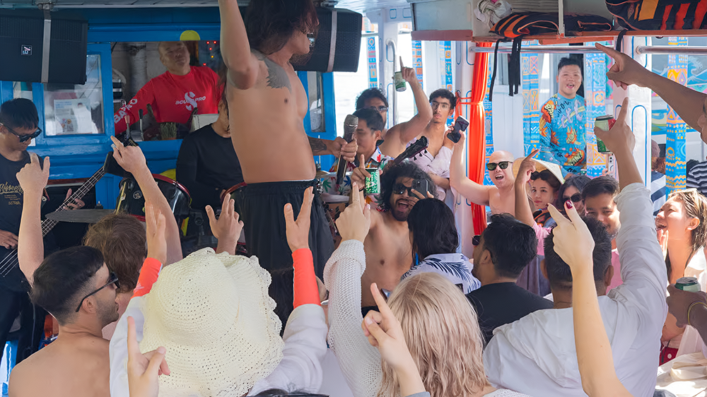 Live band and crowd dancing on the party boat