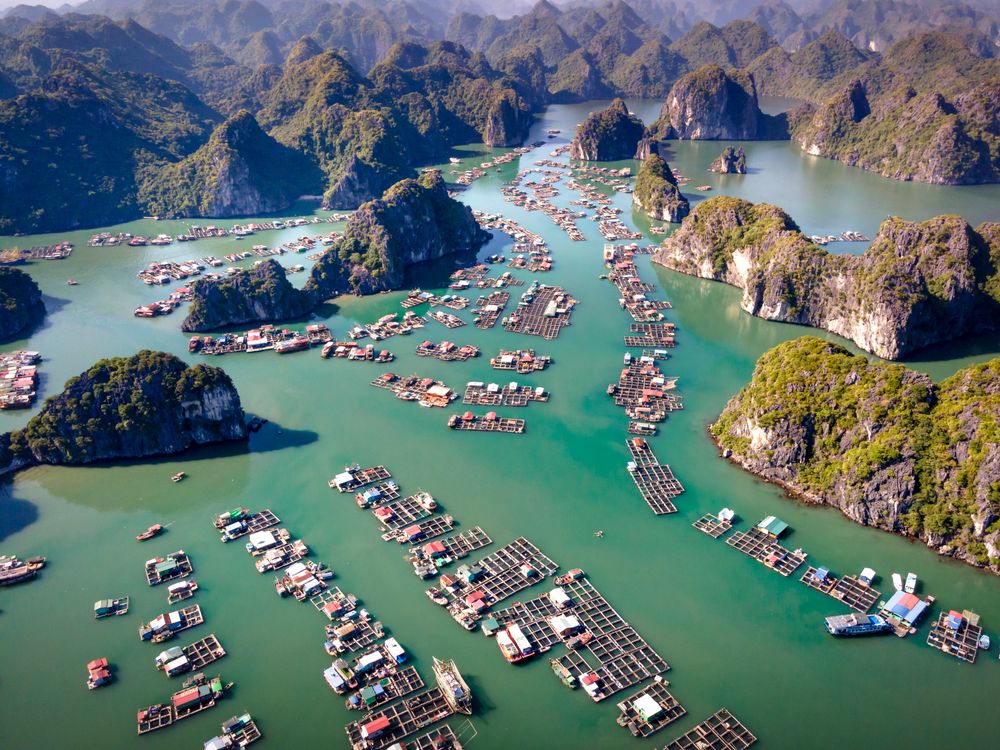 Floating fishing village among karst islands in Lan Ha Bay
